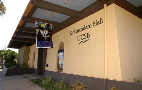 Ground level image of Embarcadero Hall building with UCSB letters below